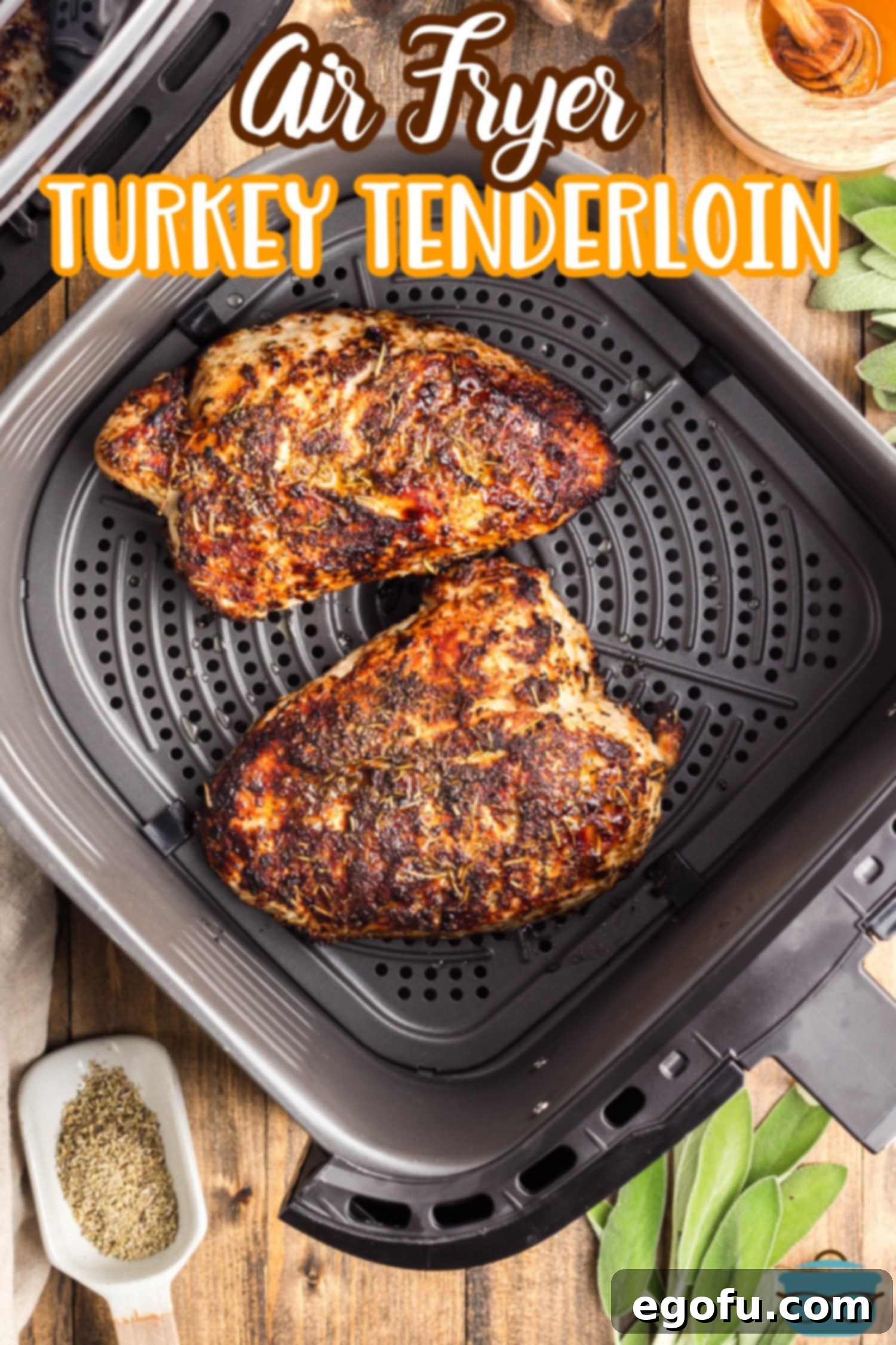 Flavorful Air Fryer Turkey Tenderloin 3 Looking down on the Air Fryer Turkey Tenderloins in the basket.