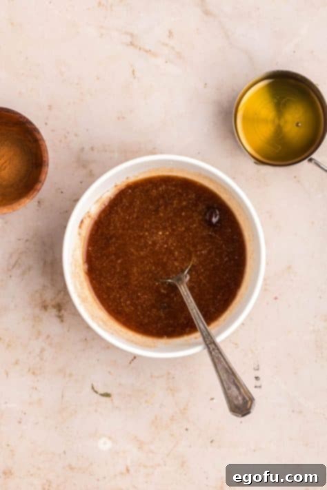 Butter, honey, and cinnamon in a dish.