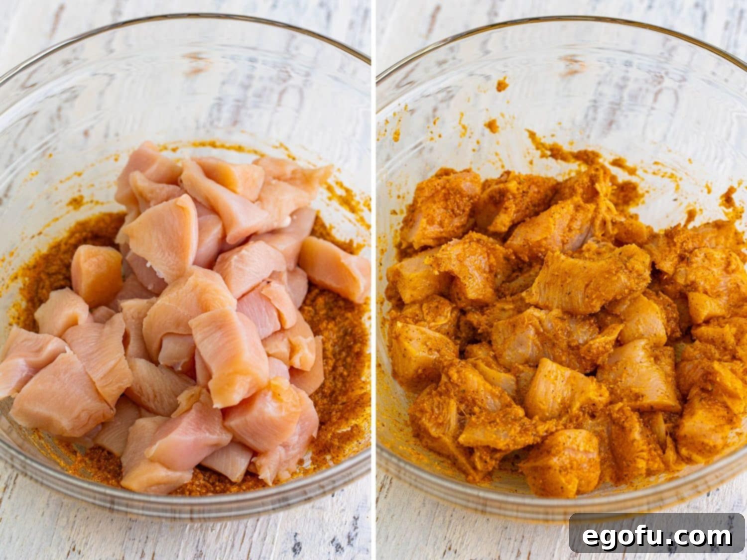 Diced chicken breast being added to the creamy marinade in a bowl and gently mixed to ensure each piece is fully coated.