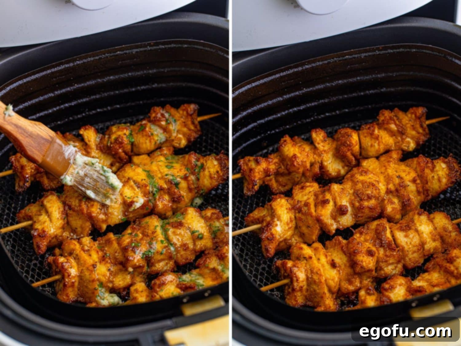 A close-up shot of garlic butter sauce being meticulously brushed onto sizzling chicken skewers inside an air fryer basket during cooking.