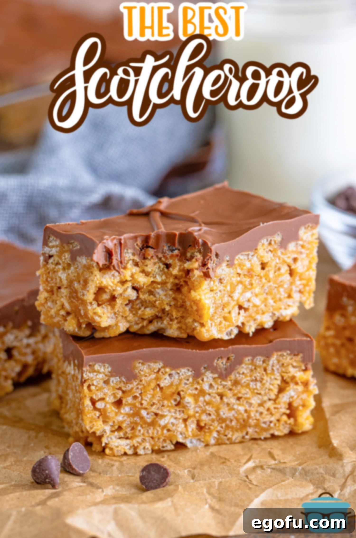 Crispy Peanut Butter Dream Bars 4 A small pile of Scotcheroos and the top one has a bite missing.