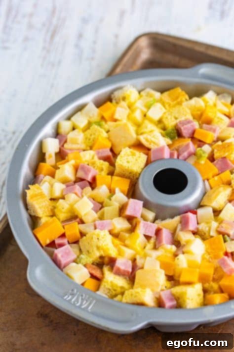 The egg mixture over the rest of the breakfast cake mixture in a bundt pan.