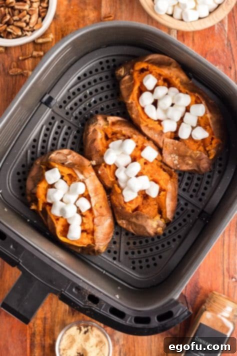 Sweet potatoes topped with mini marshmallows.