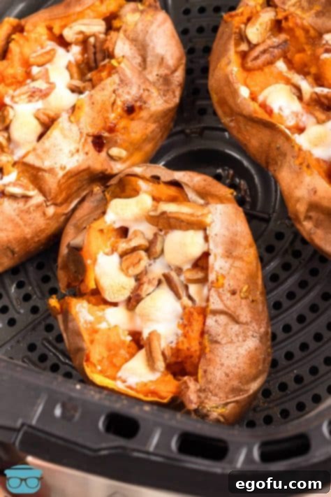 Close up looking at a few Air Fryer Baked Sweet Potatoes.