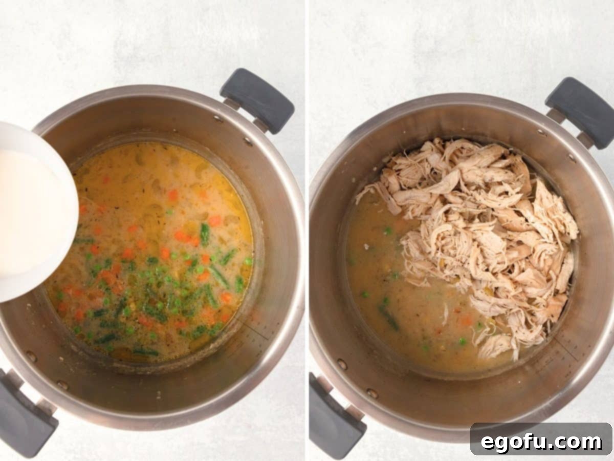 The thickened vegetable mixture in the Instant Pot with shredded chicken being added and stirred in to complete the pot pie filling.