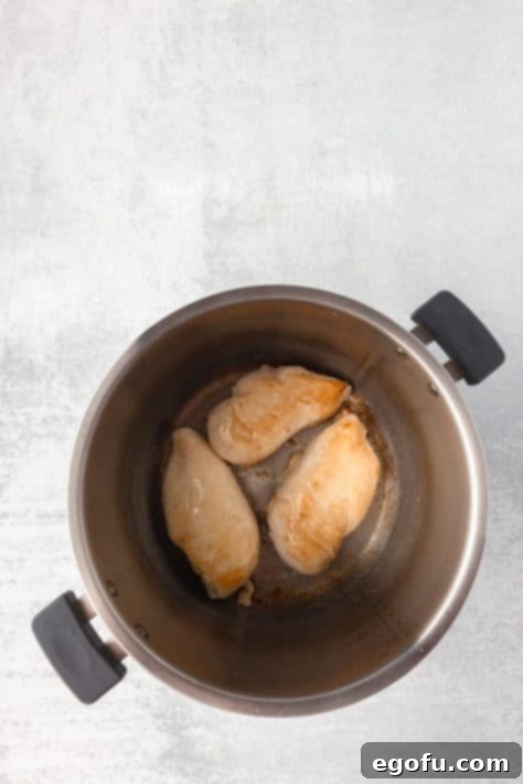 Chicken being cooked in the Instant Pot.