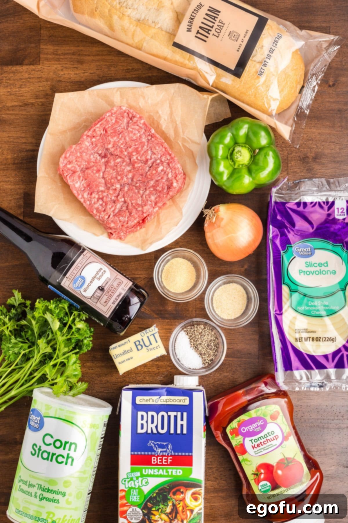 Ground beef, Italian loaf, butter, garlic powder, onion powder, provolone cheese, yellow onion, green bell pepper, low sodium beef broth, ketchup, Worcestershire sauce, cornstarch, salt, pepper, and parsley.