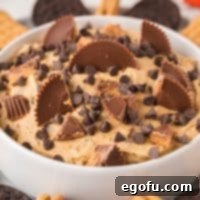 A delightful bowl of Peanut Butter Fluff adorned with toppings.