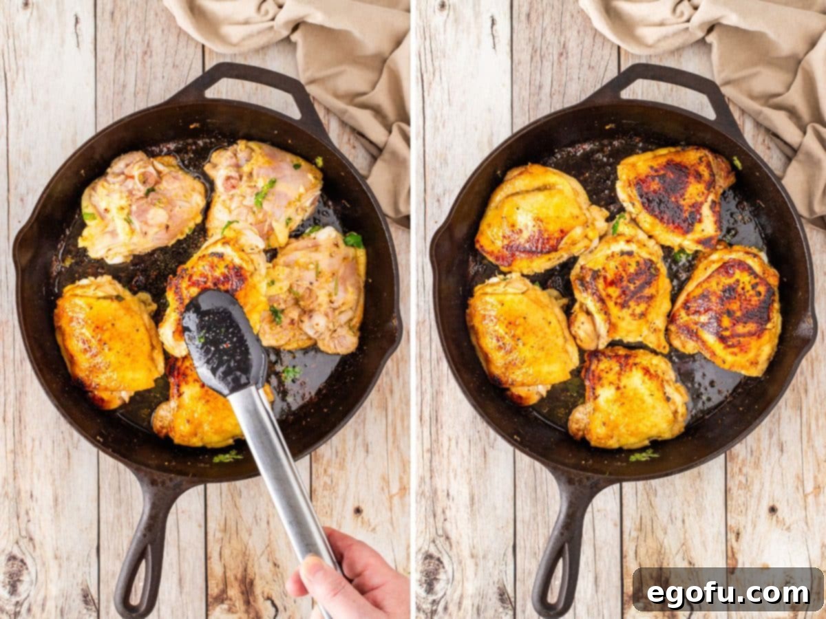 Zesty Cilantro-Lime Chicken 9 Chicken thighs being flipped over in a cast iron pan.
