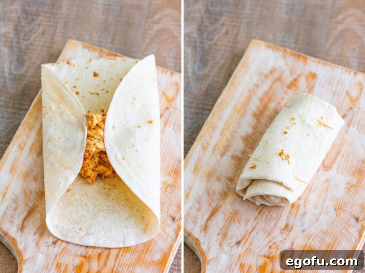 A step-by-step image showing how to fold a flour tortilla filled with chicken mixture, securing the ends before rolling it tightly into a compact burrito shape, illustrating the wrapping technique.