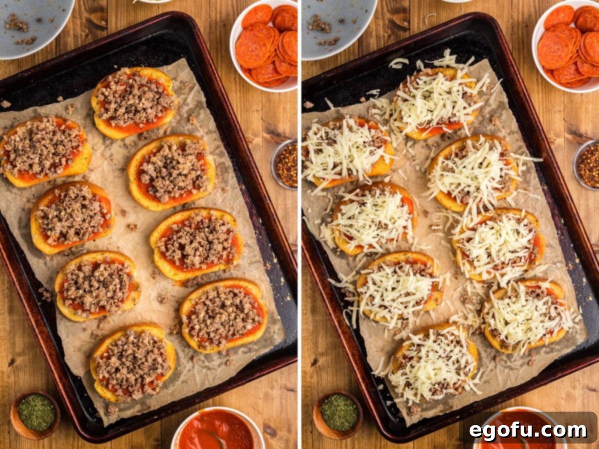 Slices of garlic bread with pizza sauce, crumbled sausage, and a generous layer of mozzarella cheese.