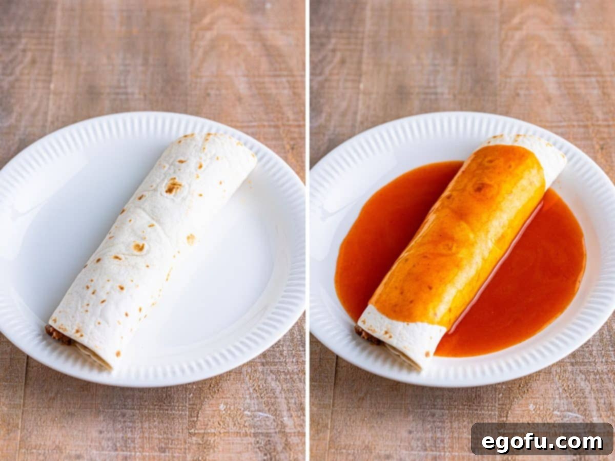 A perfectly rolled tortilla, filled with delicious ingredients, awaiting its generous topping of enchilada sauce on a plate.