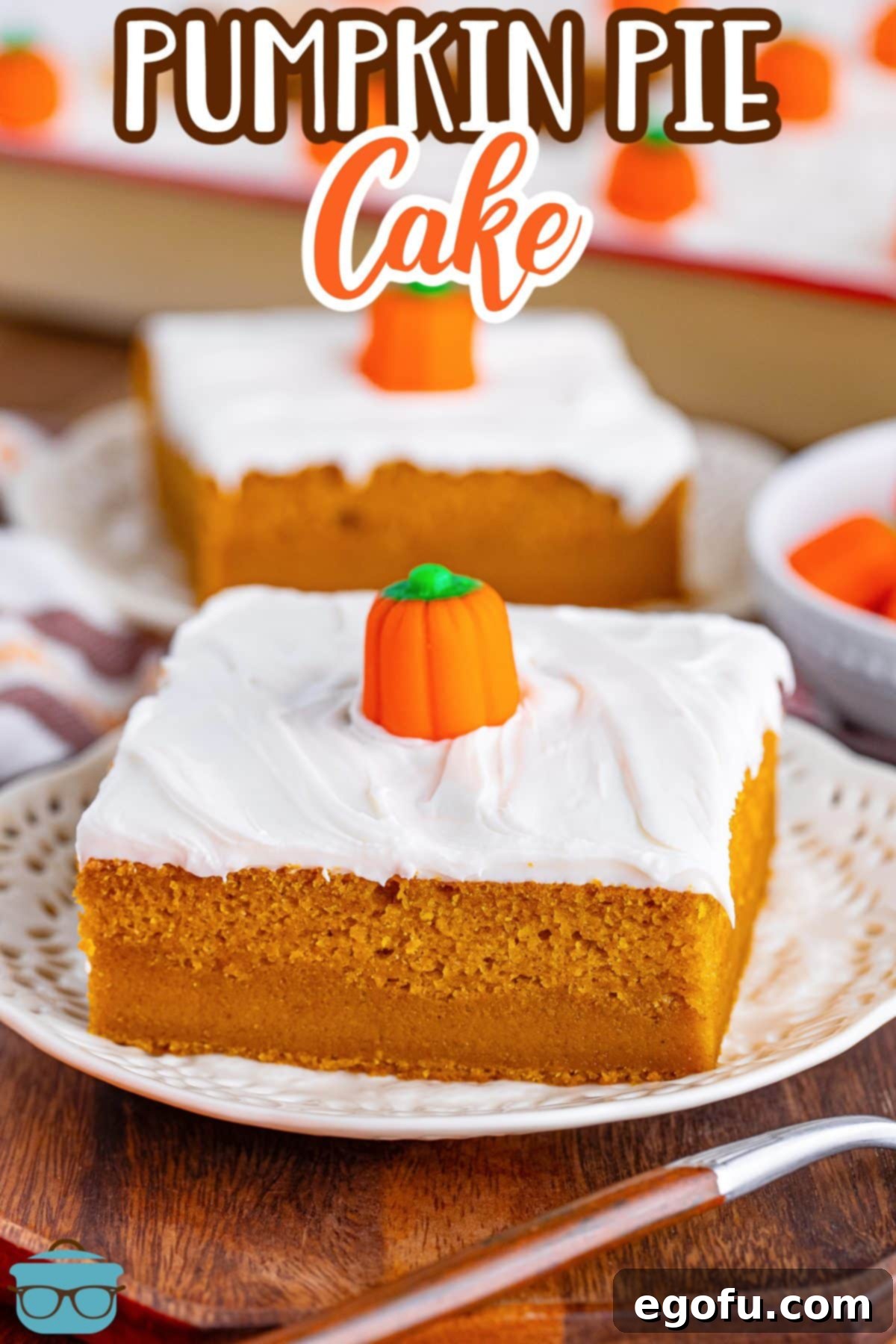 Decadent Pumpkin Pie Cake 3 Several slices of freshly baked and frosted Pumpkin Pie Cake, artfully arranged on dessert plates, ready to be enjoyed.