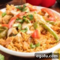 Effortless Arroz con Pollo 8 A dinner plate of Arroz Con Pollo, ready to be enjoyed.