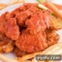 Closely looking down on a pile of Boneless Chicken Wings.