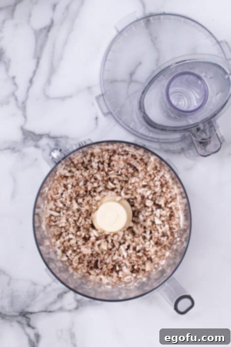 Mushrooms in a food processor.
