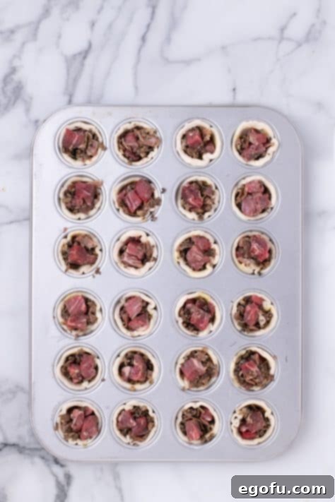 Mushroom mixture with beef in puff pastry.