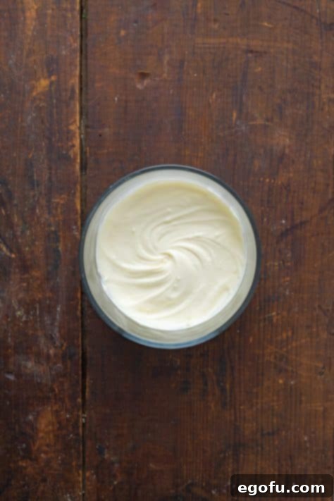 Effortless Slow Cooker Angel Chicken 11 A bowl of softened cream cheese and butter.