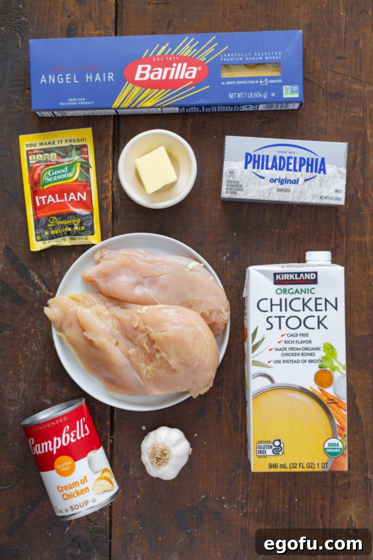 Effortless Slow Cooker Angel Chicken 4 Angel hair pasta, chicken broth, cream of chicken soup, cream cheese, butter, Italian dressing dry mix, olive oil, salt, pepper and chicken breasts.