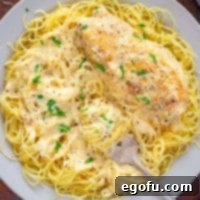 Effortless Slow Cooker Angel Chicken 9 Looking down directly over a plate of Crock Pot Angel Chicken.