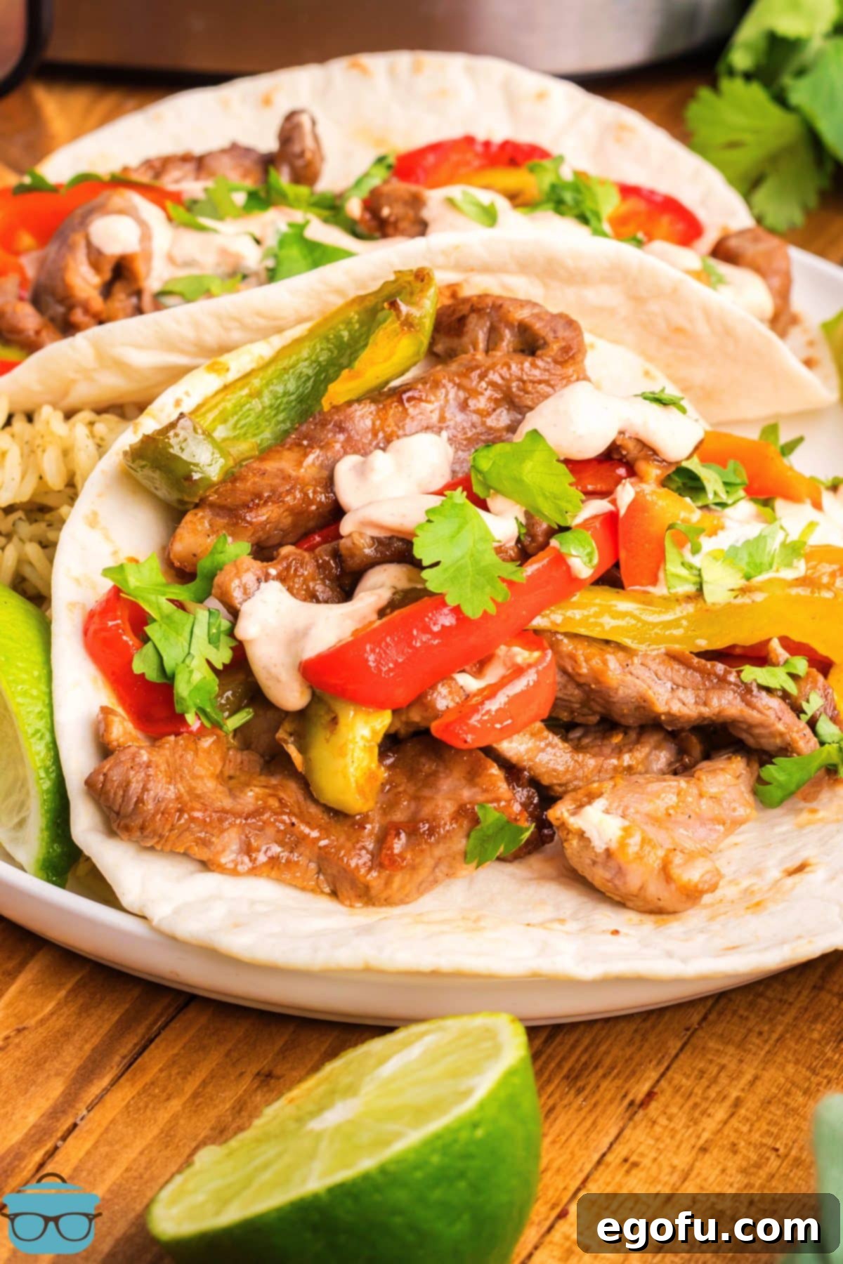 A few homemade Air Fryer Steak Fajitas on a plate.