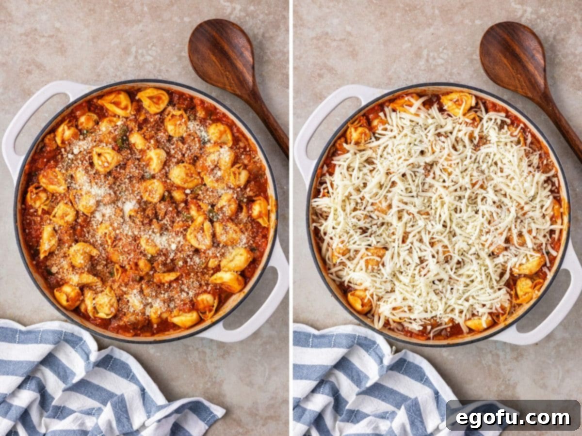 Cheese being added to a tortellini and sauce skillet, followed by pepperoni slices being arranged on top.