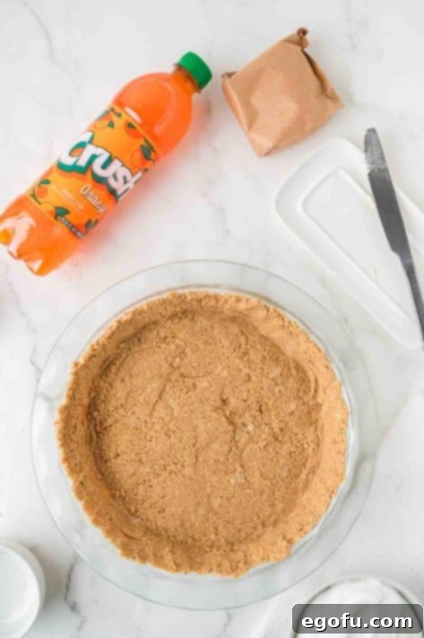 Zesty Orange Cream Pie 12 Homemade Graham Cracker Crumb Crust in a pie plate.