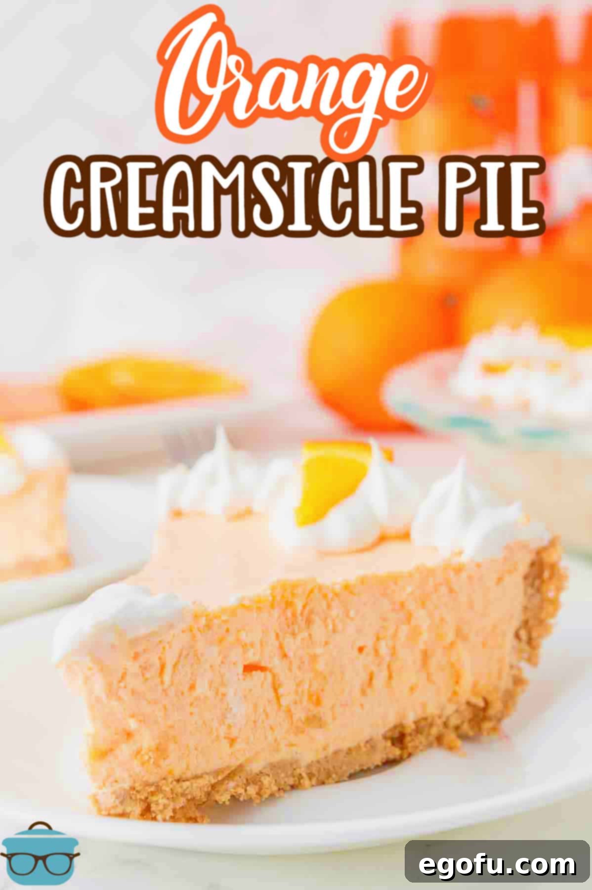 Zesty Orange Cream Pie 3 A slice of Orange Creamsicle Pie on a dessert plate, showcasing its vibrant color and smooth texture.