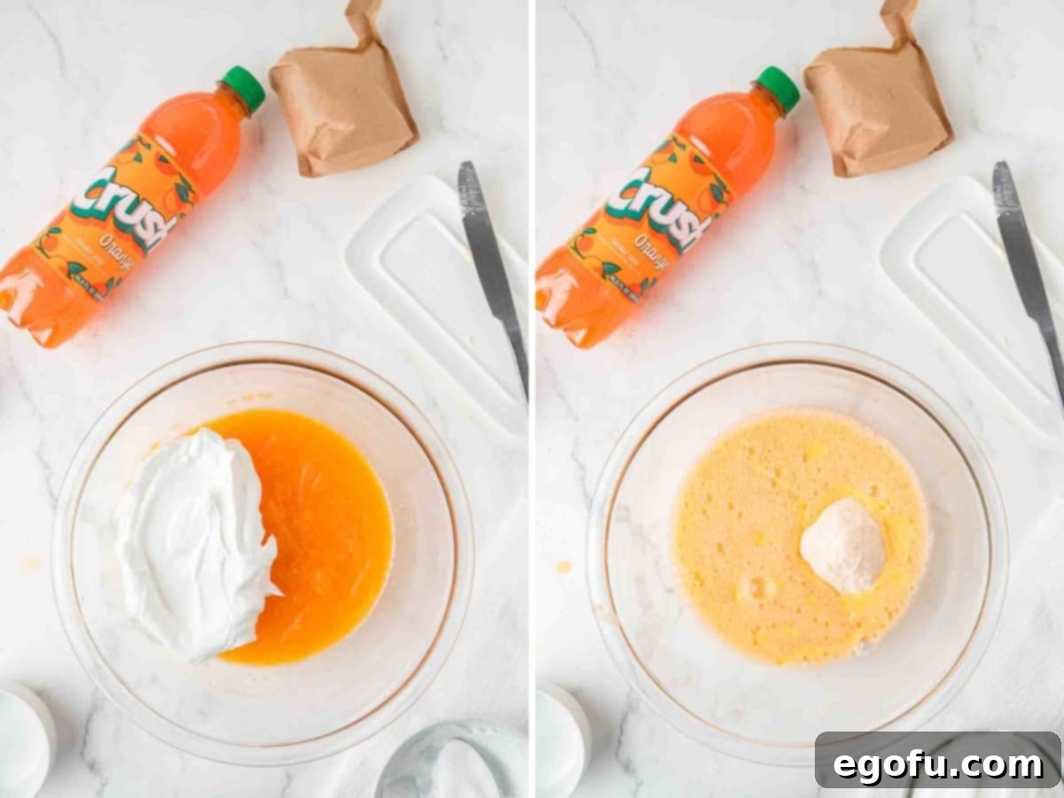 Zesty Orange Cream Pie 6 A bowl with orange soda, vanilla pudding, and Cool Whip being mixed together to create the creamy filling.