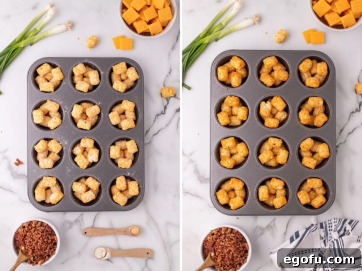 Frozen tater tots arranged in a muffin tin, ready for their first bake.