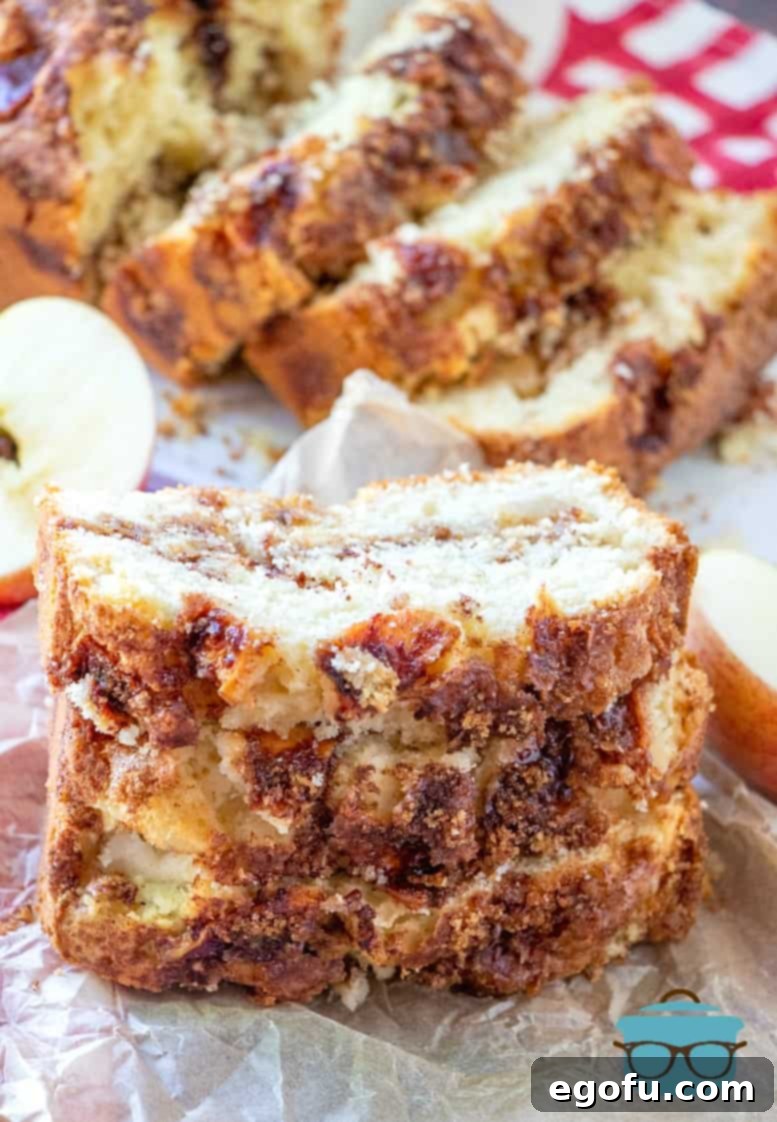 Sliced Apple Pie Bread on parchment paper.