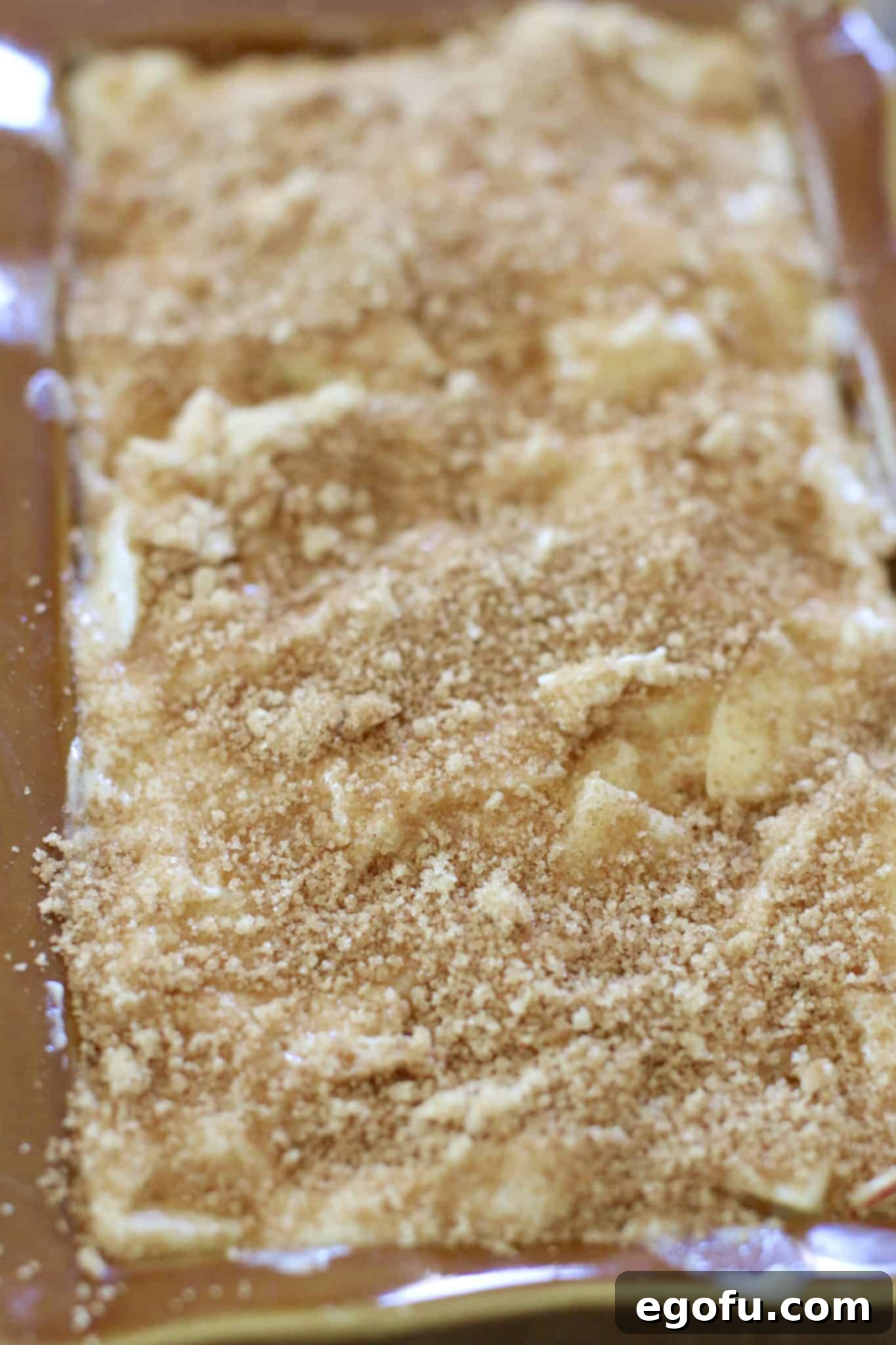 Top of bread mixture sprinkled with cinnamon sugar.