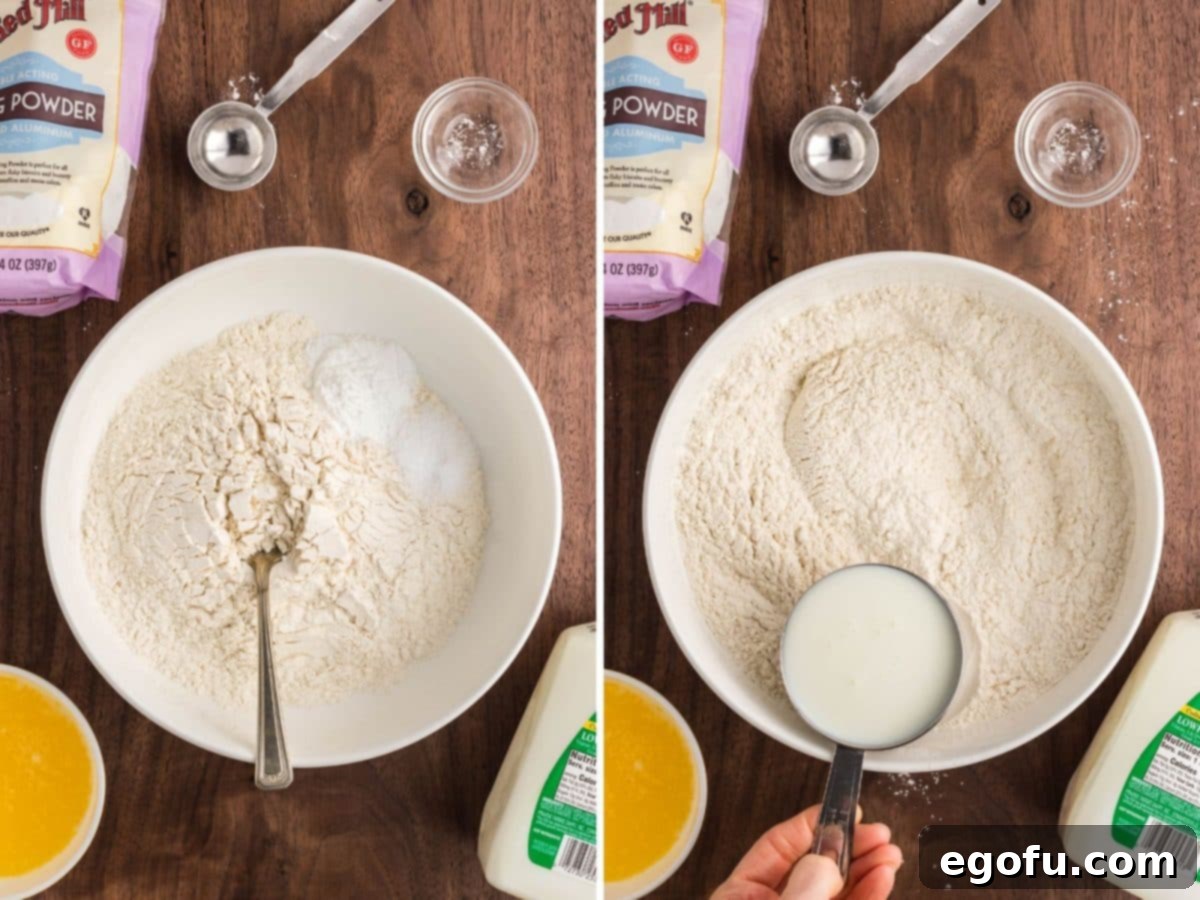 Baking powder, flour, and salt in a bowl and buttermilk being added.