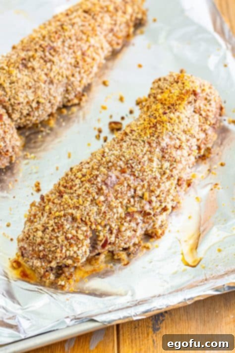 Fresh baked Pork Tenderloin on a sheet pan.