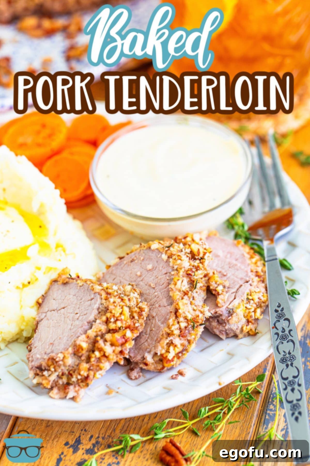 A few slices of Herb Crusted Pork Tenderloin on a plate with sides.