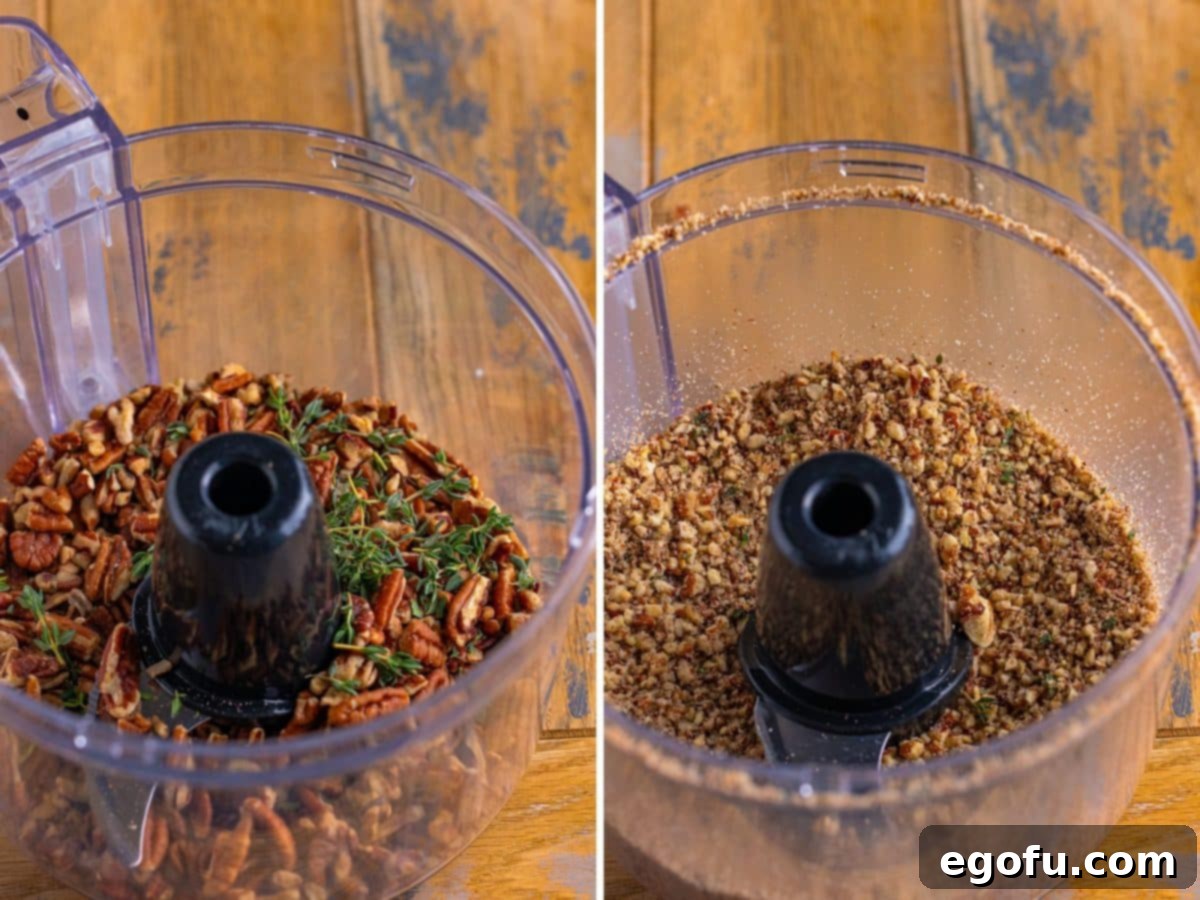 Pecans and thyme leaves in a food processor.