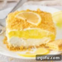 A dessert plate with a slice of Lemon Delight.