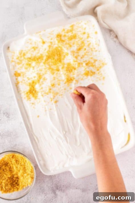 Crushed Oreos over the Cool Whip layer.