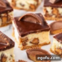 Close up looking at a few lined Reese's Cheesecake Bars.