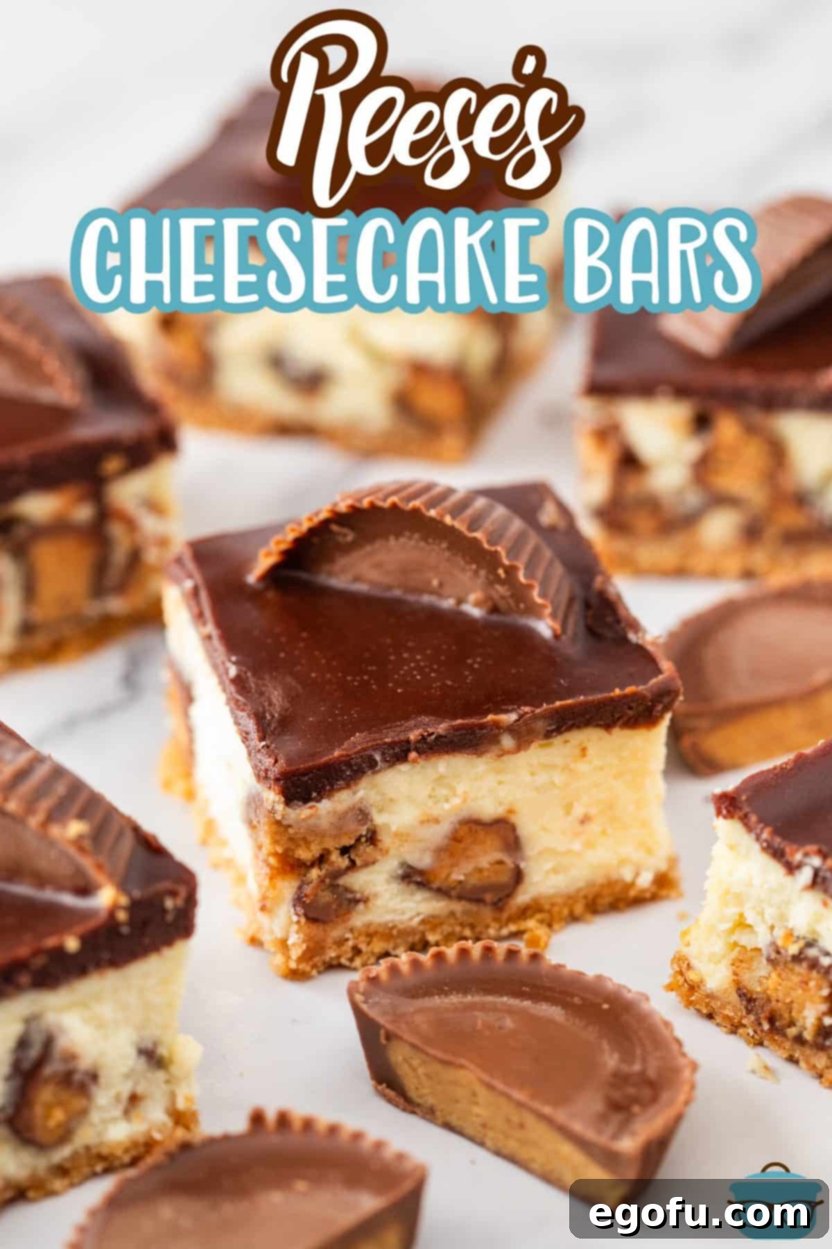 A few Reese's Cheesecake bars with ganache and chopped Reese's.