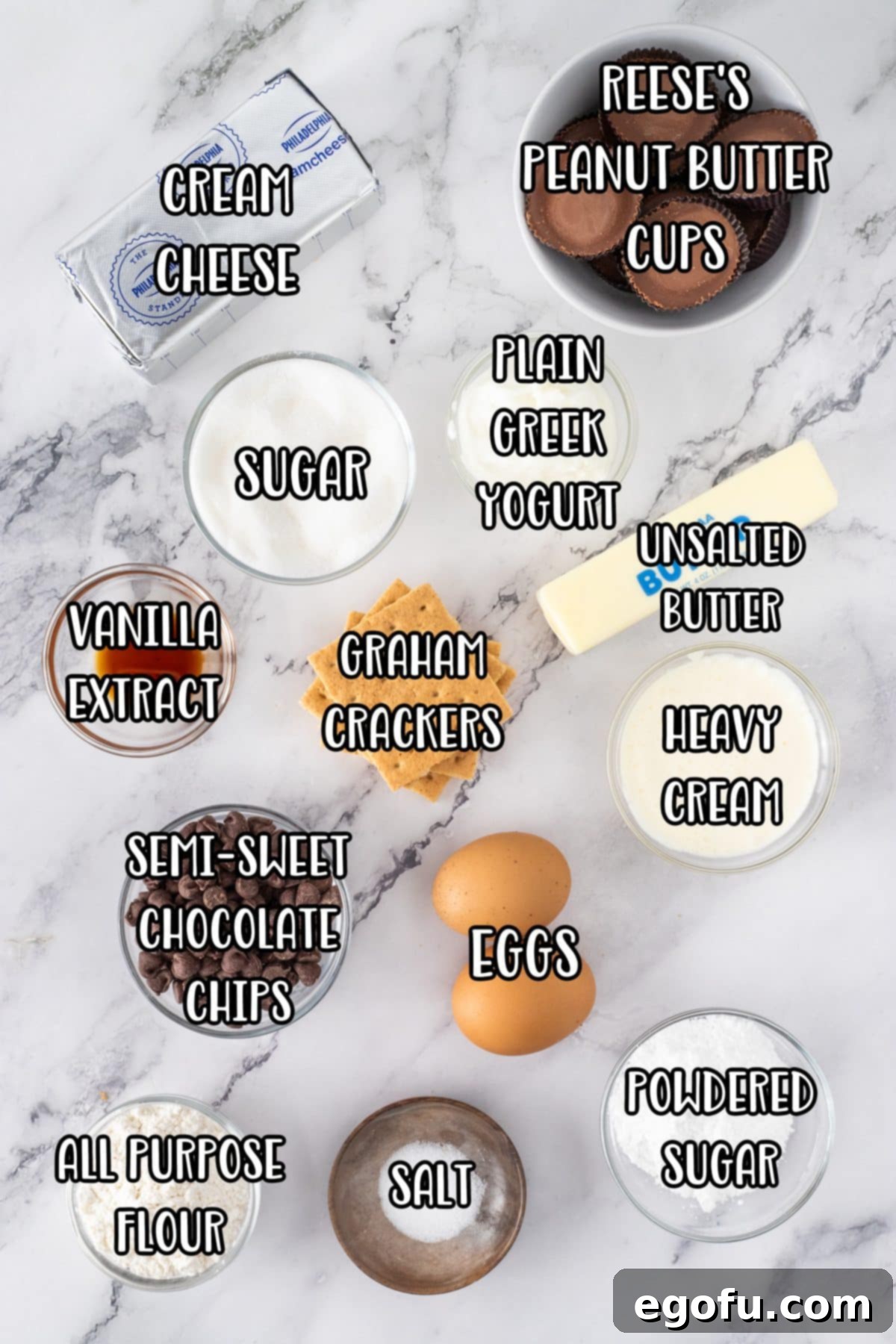 Cream cheese, Reese's Peanut Butter cups, vanilla extract, plain Greek yogurt, granulated sugar, powdered sugar, butter, graham crackers, heavy cream, semi-sweet chocolate chips, eggs, salt, and all purpose flour.