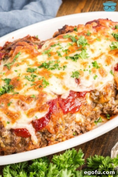 Grandma's Secret Italian Meatloaf 17 A container of Italian Meatloaf with parsley on top.