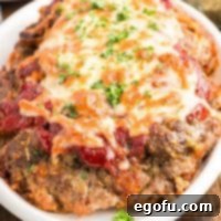 Grandma's Secret Italian Meatloaf 10 A close-up view of Italian Meatloaf, showing its texture and topping.
