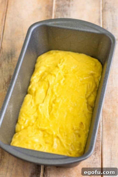 Tropical Coconut Bake 11 A loaf pan with Coconut Bread batter.