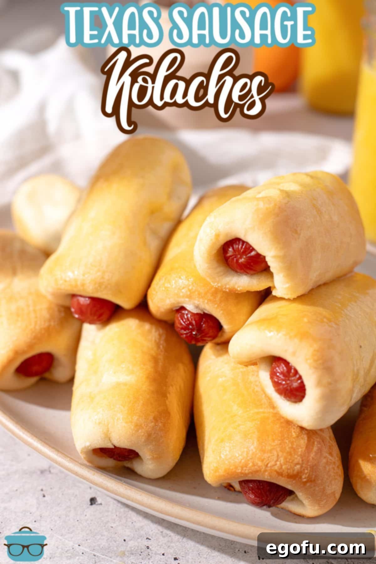 Hearty Texas Sausage Kolaches 3 A small pile of Texas Sausage Kolaches, golden brown and ready to eat.