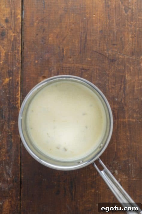 Thickened enchilada sauce ready in a pot.