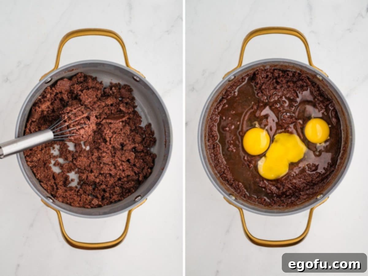 Rocky Road Bliss Bars 6 Eggs and vanilla being added to the chocolate and sugar brownie mixture.