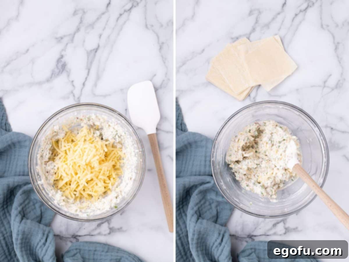 Crispy Jalapeño Wonton Poppers 7 Shredded cheese being added to a bowl of cream cheese mixture.