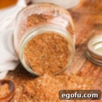 A container of spilled Homemade Fajita Seasoning.