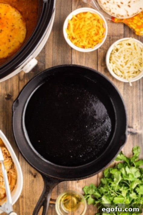 Oil being heated in a skillet.